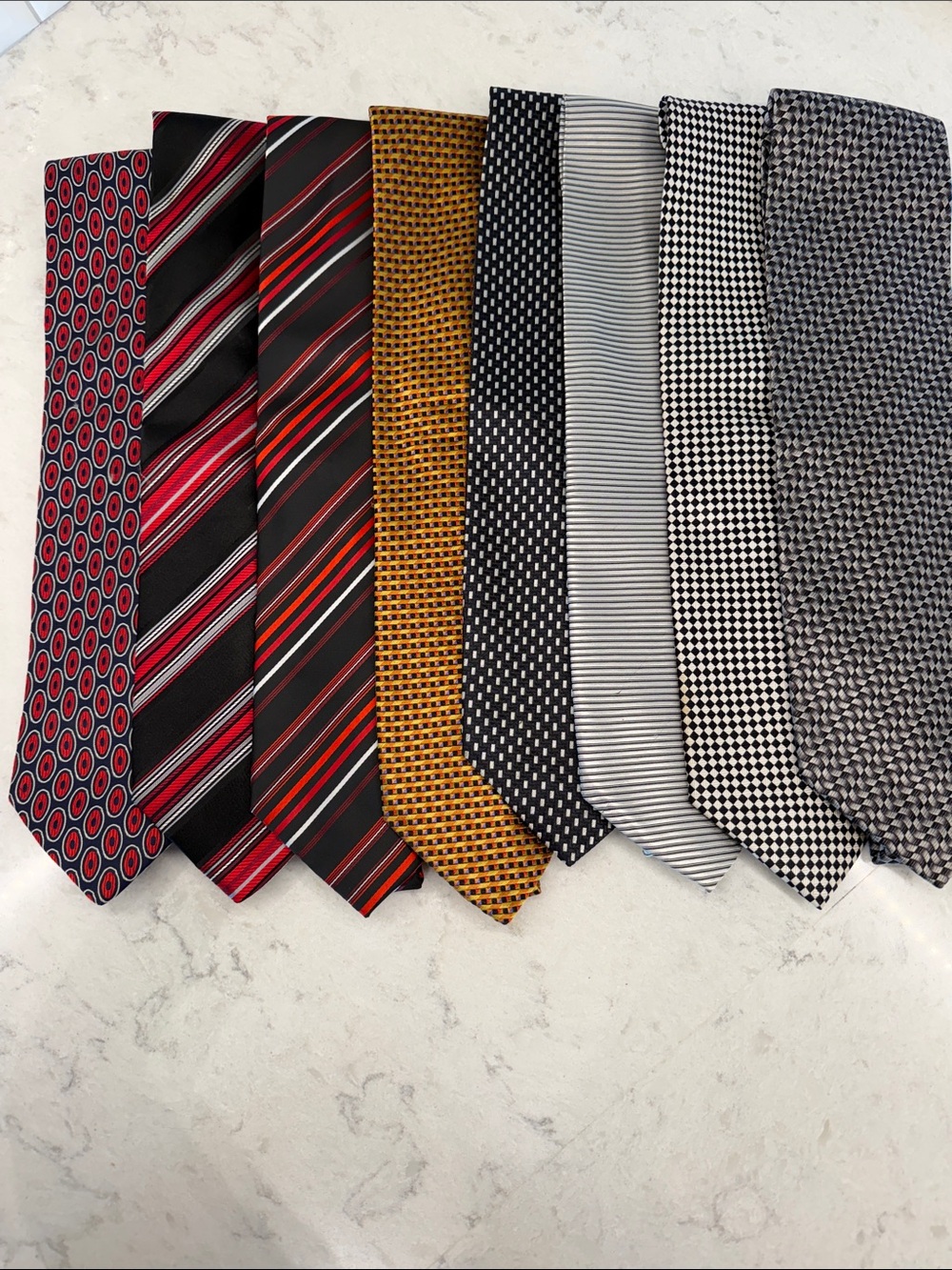 EIGHT men’s silk ties